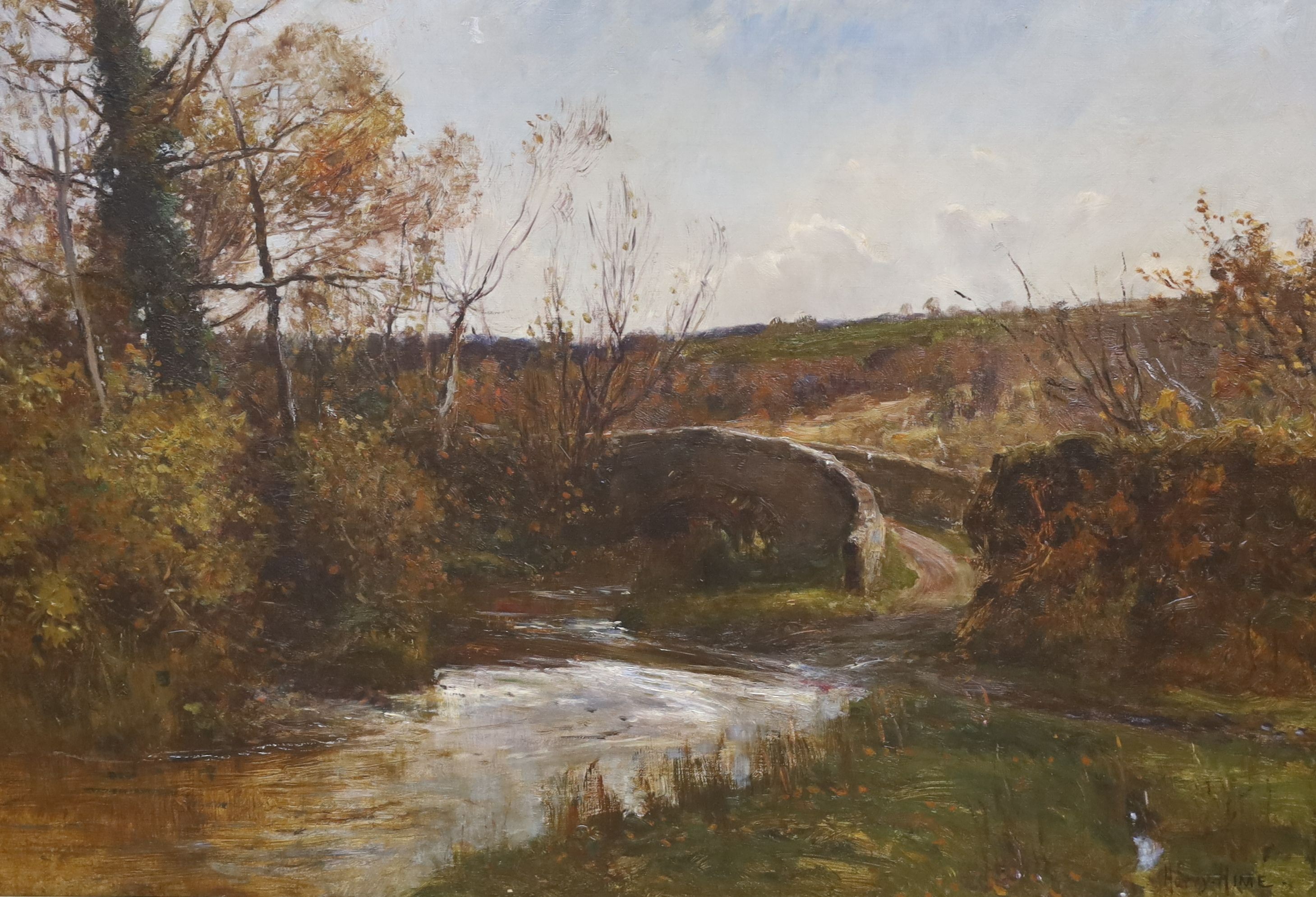 Harry Hime (1863-1933), oil on canvas, River and stone bridge in a landscape, signed, 48 x 74cm